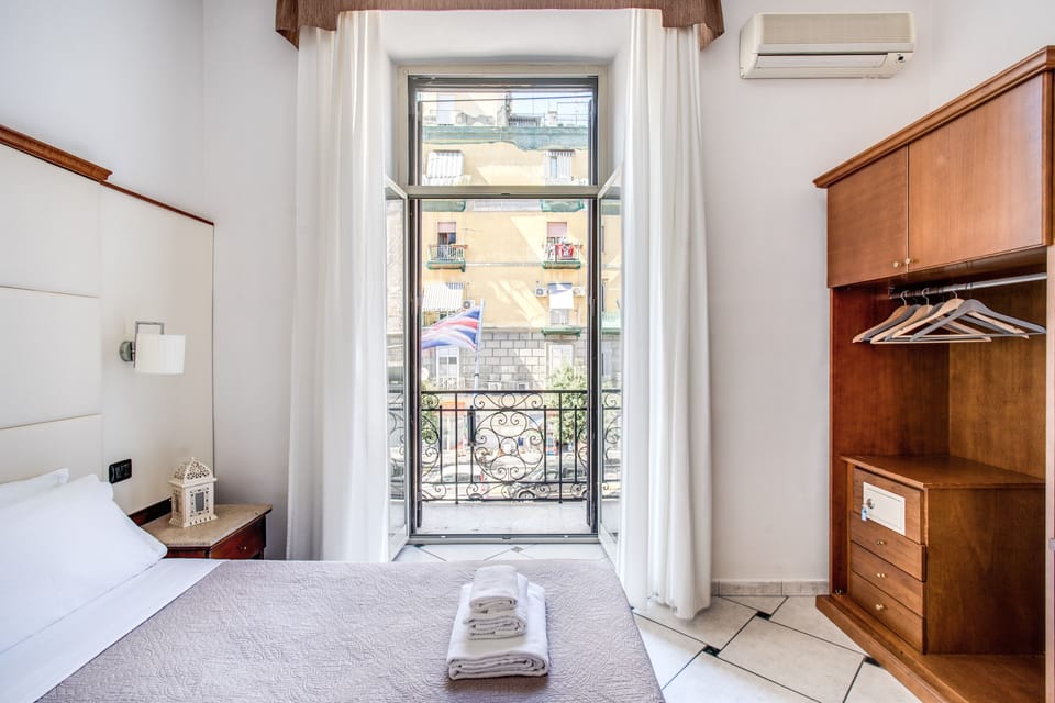 Family Room, Balcony | Premium bedding, down comforters, minibar, in-room safe