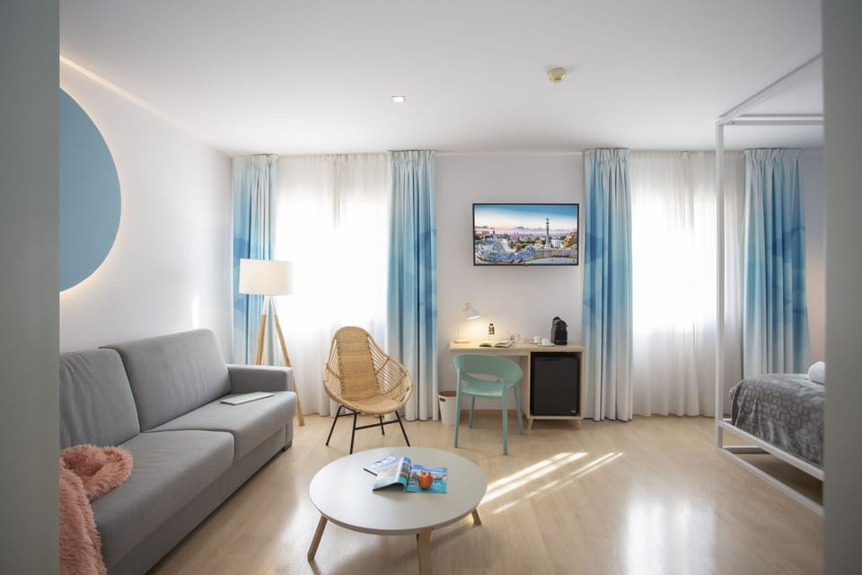 Standard Triple Room | Minibar, individually decorated, desk, laptop workspace