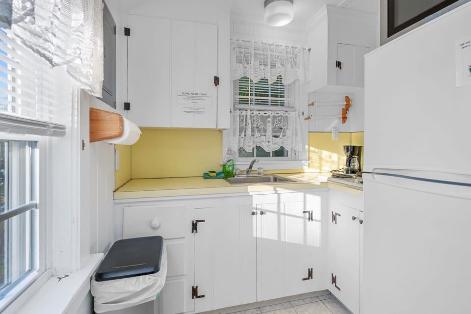 Kitchen with stove and fridge