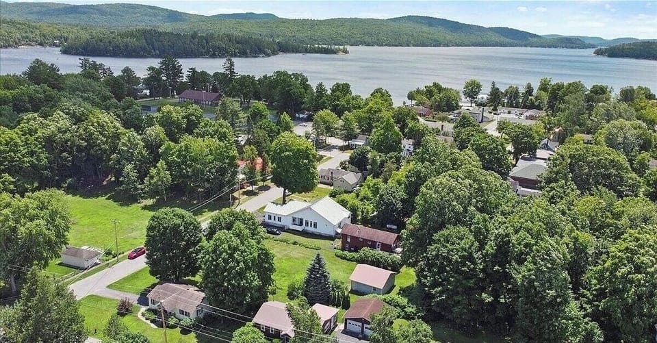 Aerial view. Schroon Lake beach is just beyond the row of trees.