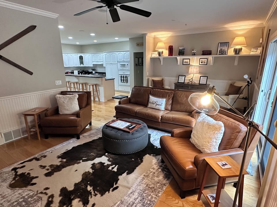 Living room, reading area and kitchen.
