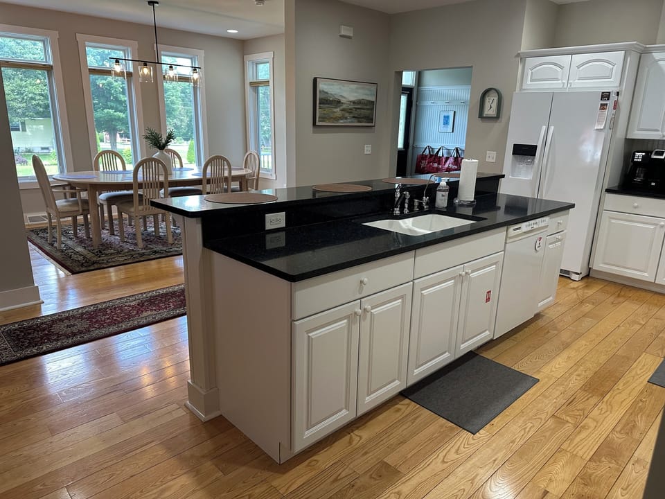Kitchen island and view of the dining room.