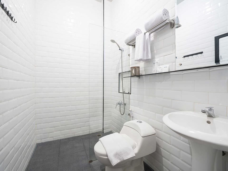 Shower, slippers, towels, soap