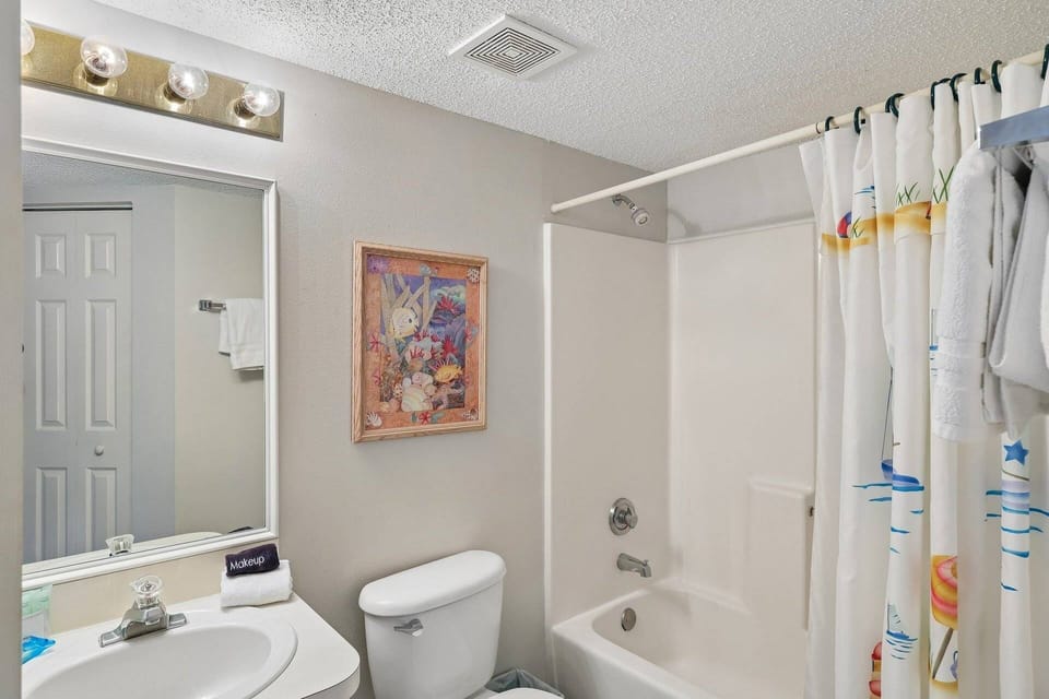 Guest bath in hall just outside guest room