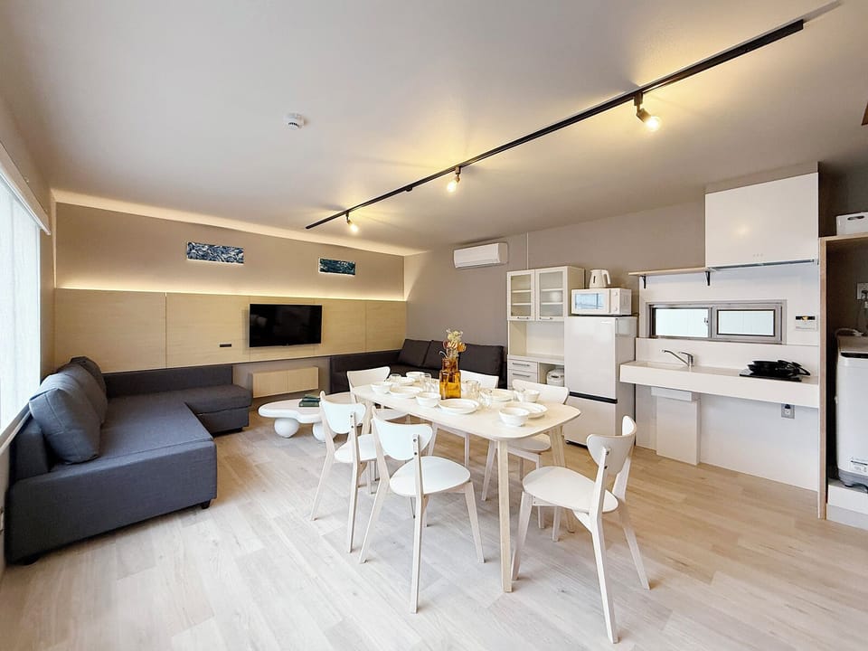 Superior Apartment, Non Smoking | Living area | 55-inch Smart TV with digital channels
