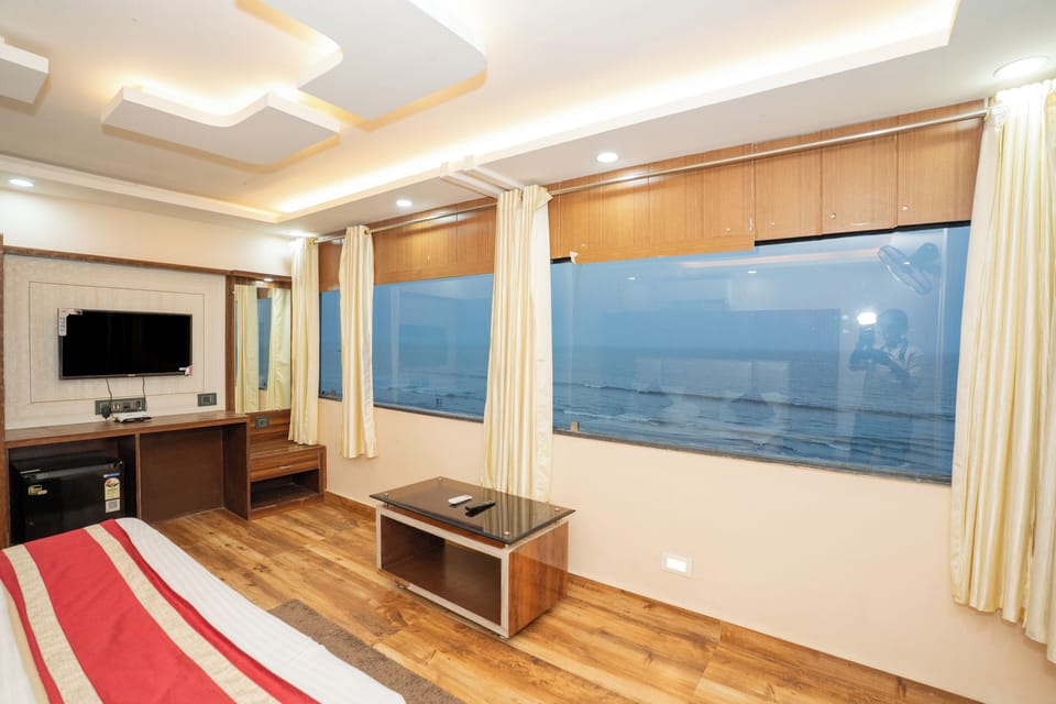 Deluxe Double Room, Balcony, Beach View | Desk, blackout drapes, free WiFi, bed sheets