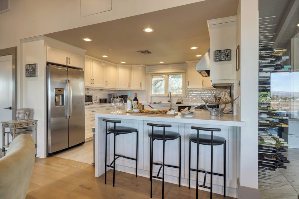 Casual seating by the kitchen counter.