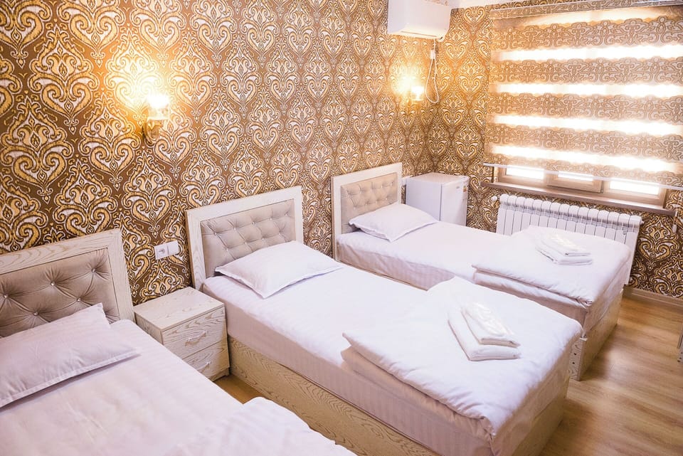 Classic Triple Room, City View | Soundproofing, WiFi (free)