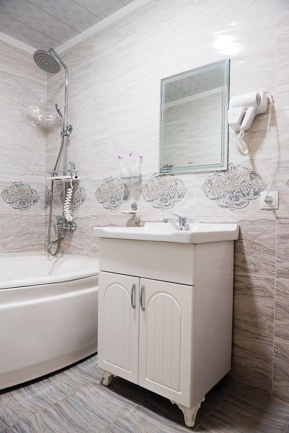 Quadruple Room, Lanai, City View | Bathroom | Hair dryer, slippers, towels, soap