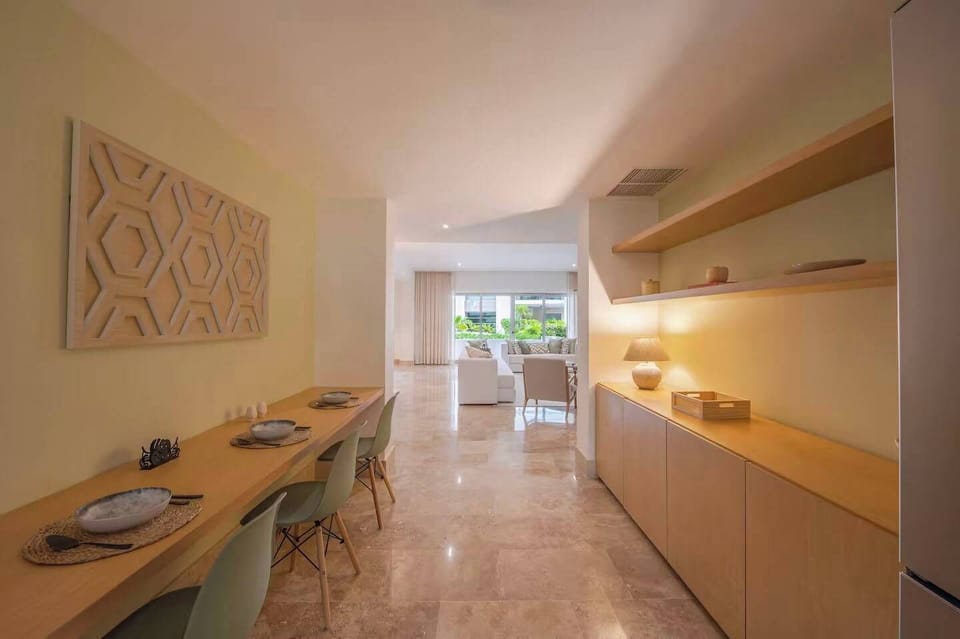Enjoy casual meals at this stylish breakfast bar opening to the living area for easy entertaining.