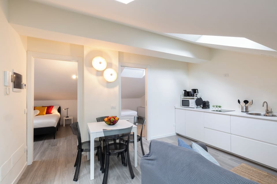 Deluxe Condo | Living area | 40-inch Smart TV with digital channels