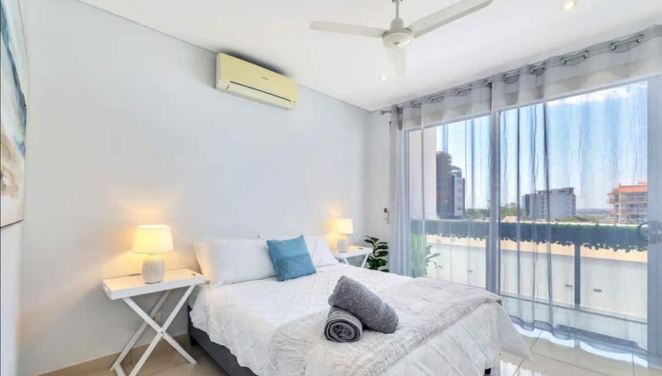 Main bedroom with sliding door opening to balcony