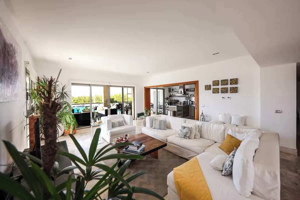 Unwind on plush sofas in the living room.