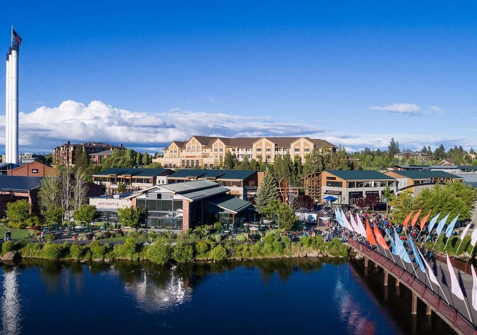 Relax at Old Mill District, historic mill buildings turned outdoor retail mall with shops, restaurants &amp; a riverside trail