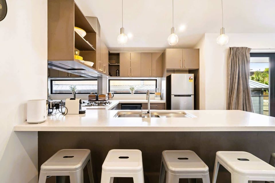 Bright kitchen and dining space with ample storage