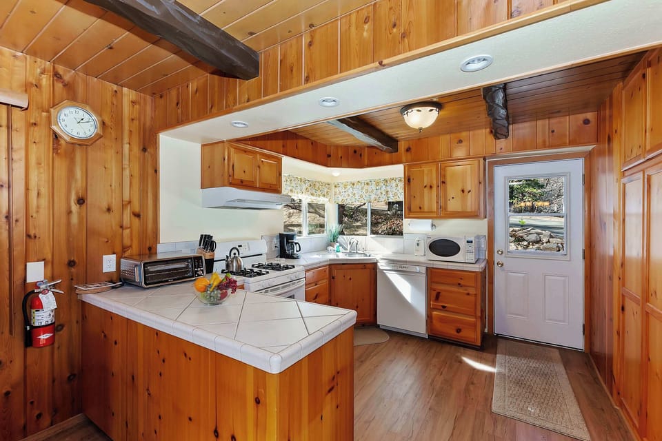 The inviting kitchen offers ample space & all the comforts of home