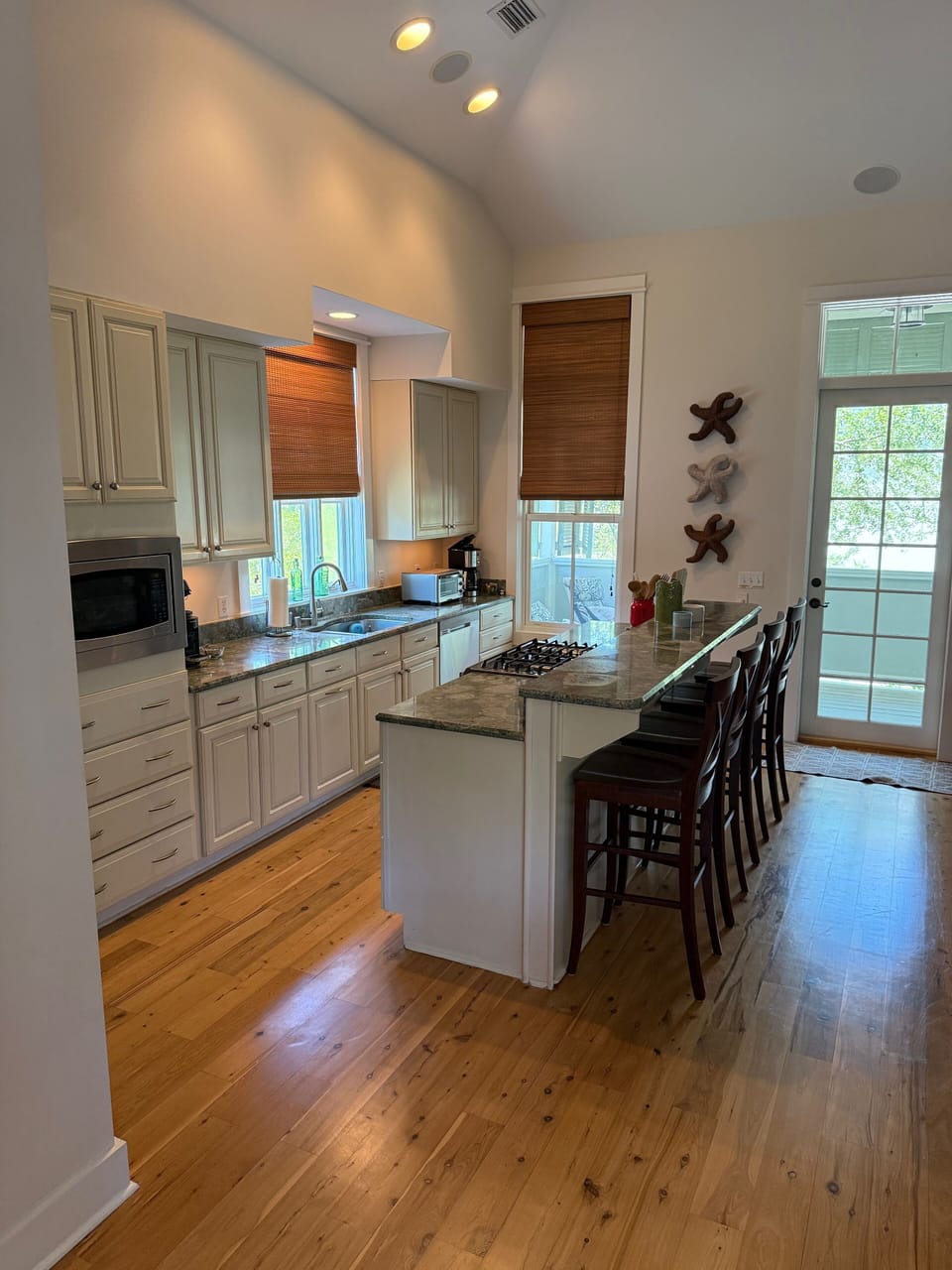 Microwave, expresso, coffee maker and toaster over
open counter seating