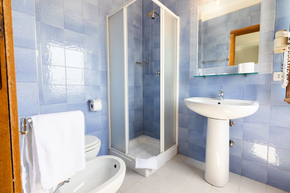 Deep soaking tub, rainfall showerhead, free toiletries, hair dryer