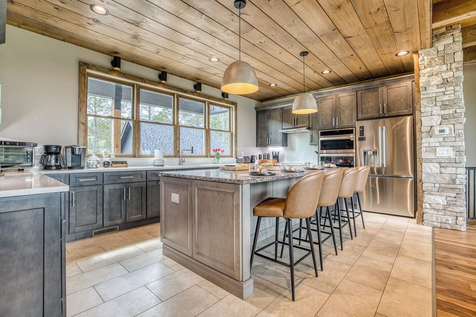 "The Lodge at Oakwood Retreat was the perfect setting for our family reunion. We shared meals at the large dining table and relaxed in the cozy living space." Guest Patty