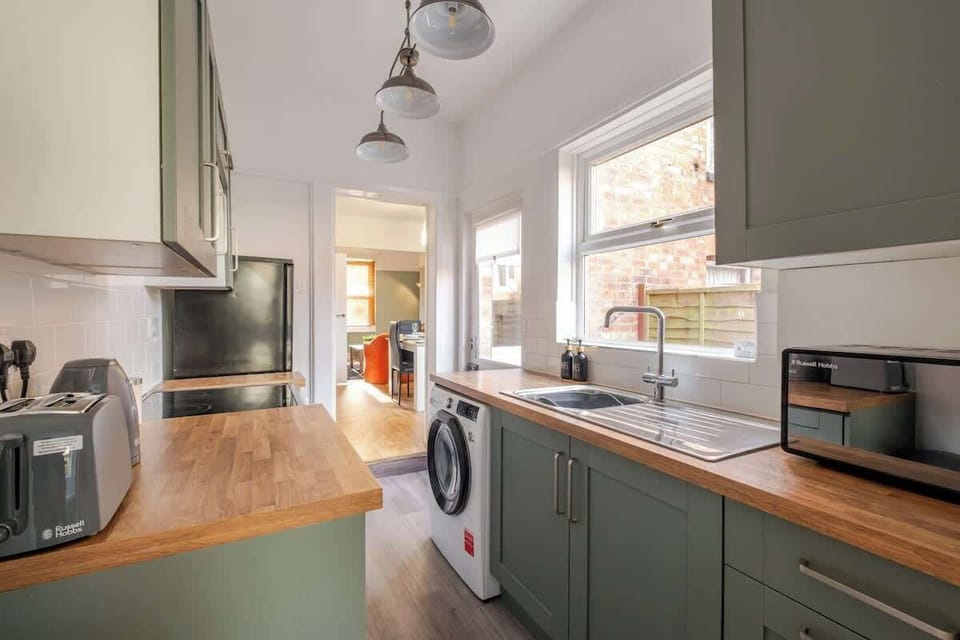 Bright, modern, and fully stocked – the kitchen is ready for whatever you’re craving