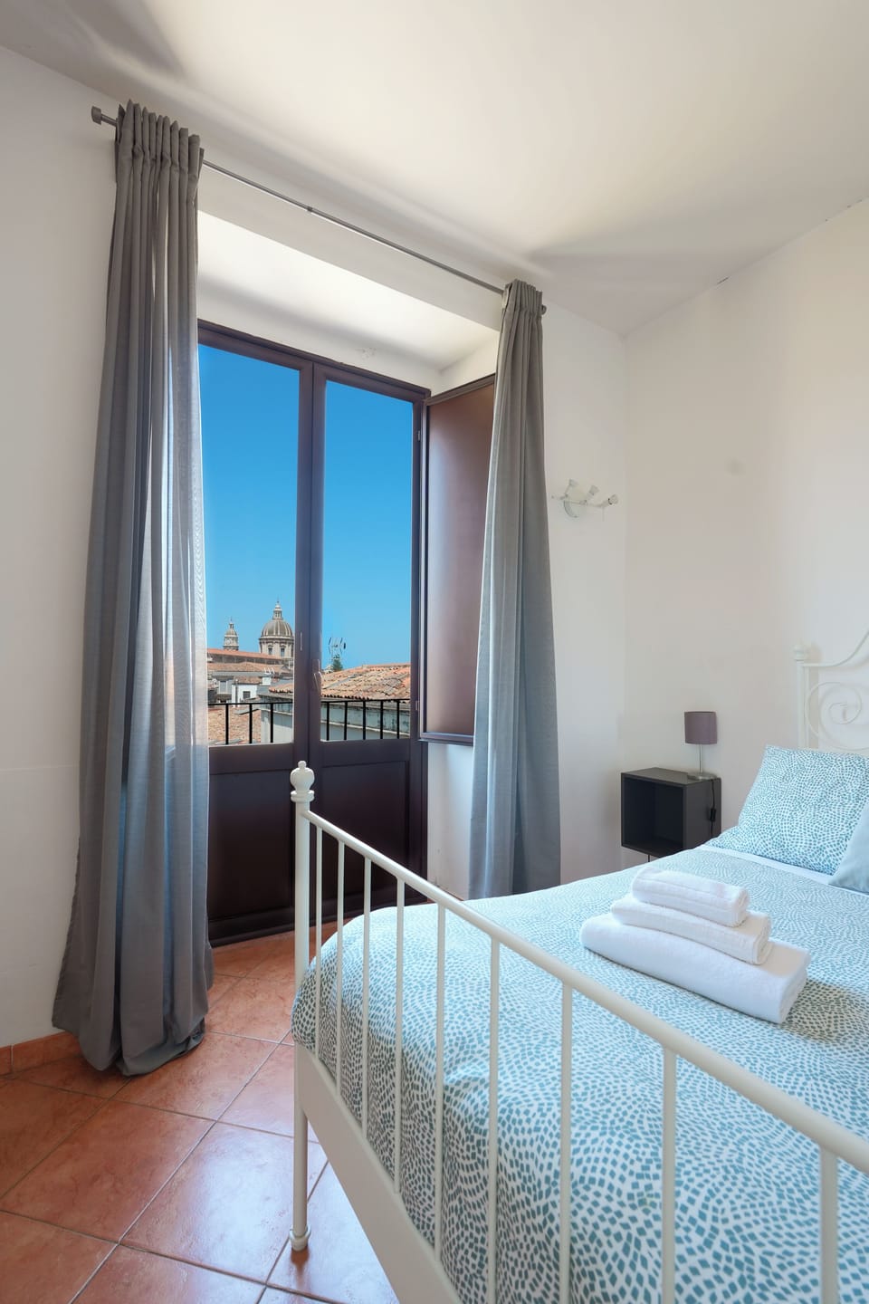 Classic Triple Room, Balcony, City View | Down comforters, minibar, blackout drapes, iron/ironing board