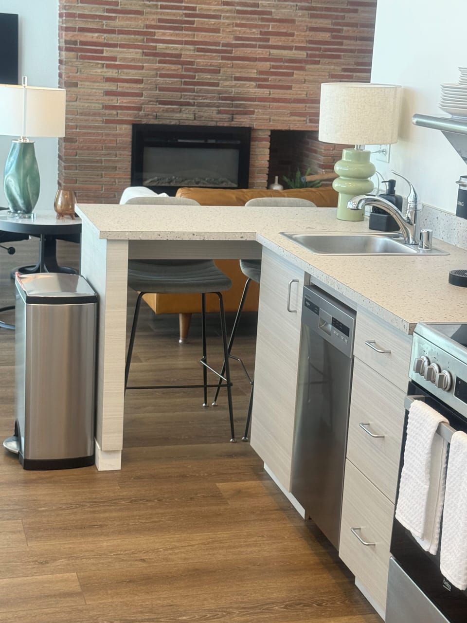 Large variety of dishes and pans included in cubbords