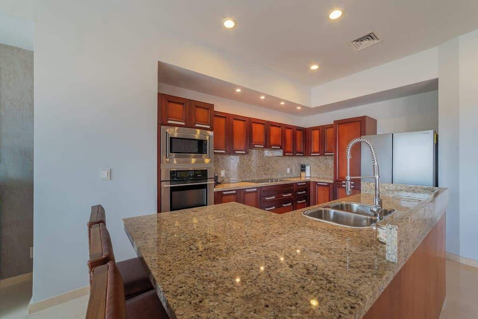 Create culinary masterpieces in this well-appointed kitchen.
