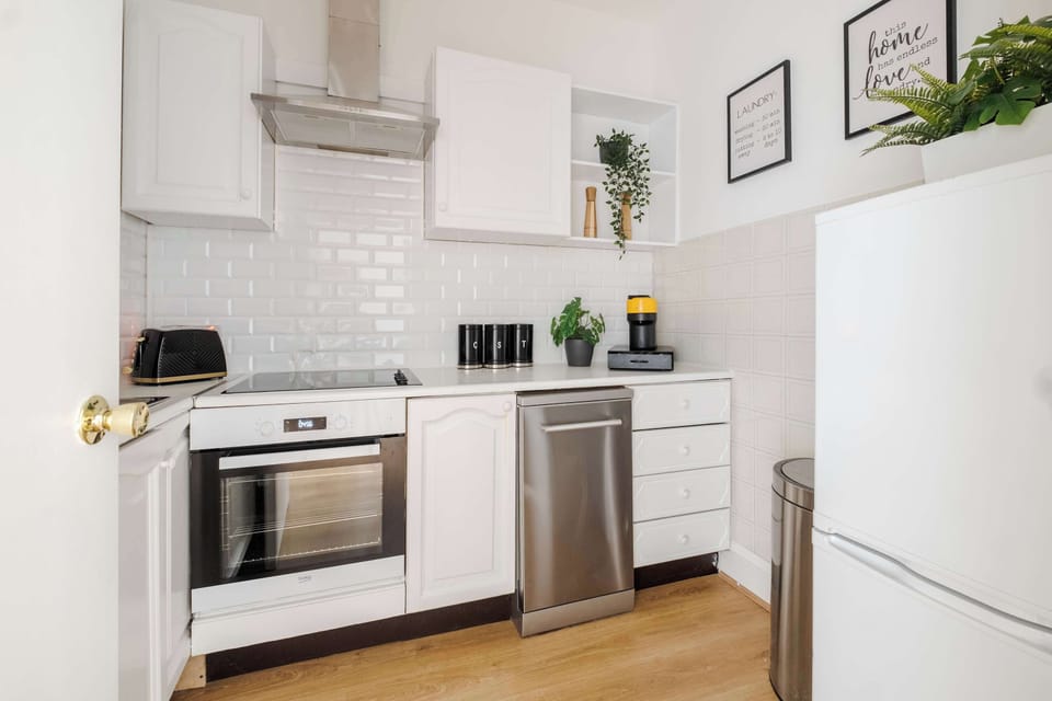 Kitchen | Enjoy the ease of home cooking in our fully equipped kitchen, featuring a washing machine, dryer, dishwasher, microwave, Nespresso machine and a fresh water dispenser for your convenience.