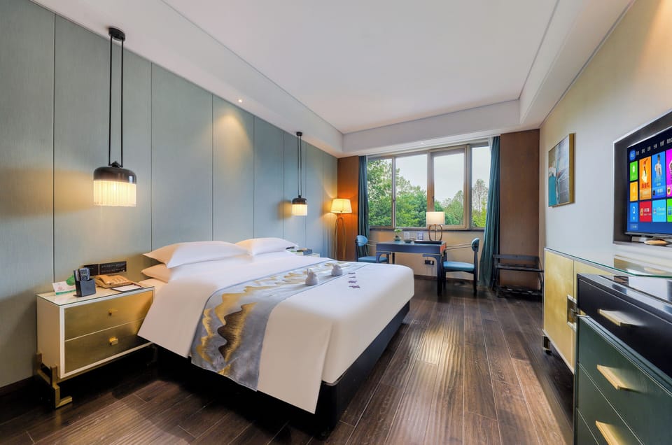 Comfort Double Room, City View | Down comforters, in-room safe, desk, laptop workspace