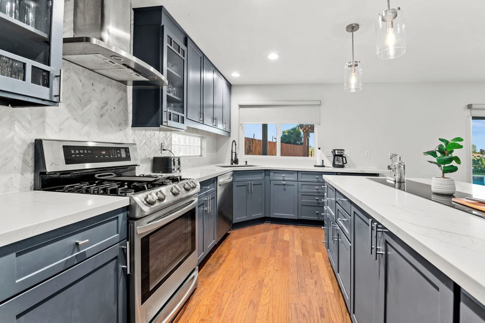 Enjoy effortless entertaining with a complete kitchen and inviting bar seating area.