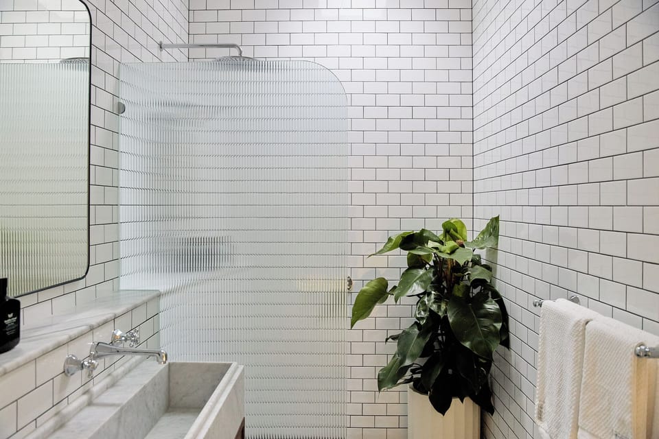 Large bathroom with natural light, Leif Products and Sheridan towels (2)