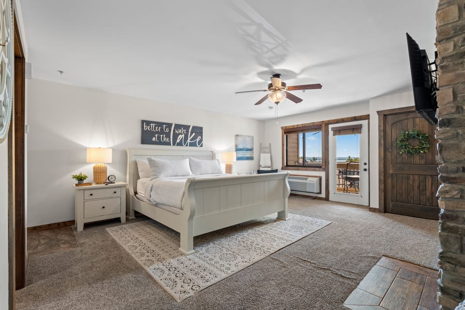 Bedroom One- King Suite with Private Balcony, Galley Kitchen, Fireplace, Cable TV, PRivate Bath