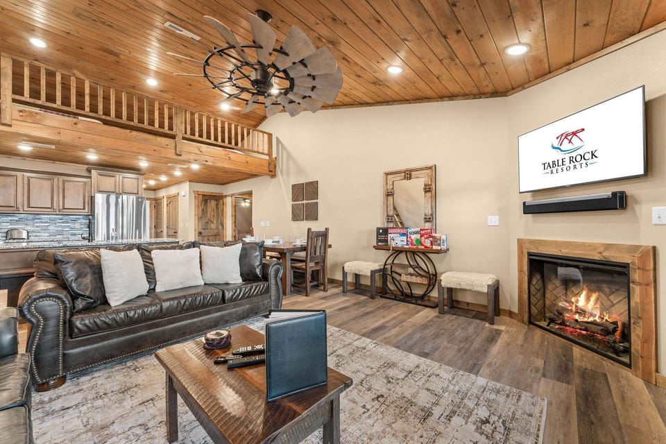 Spacious Living Area with Deck Access, Cable TV, Seasonal Fireplace, and Games.