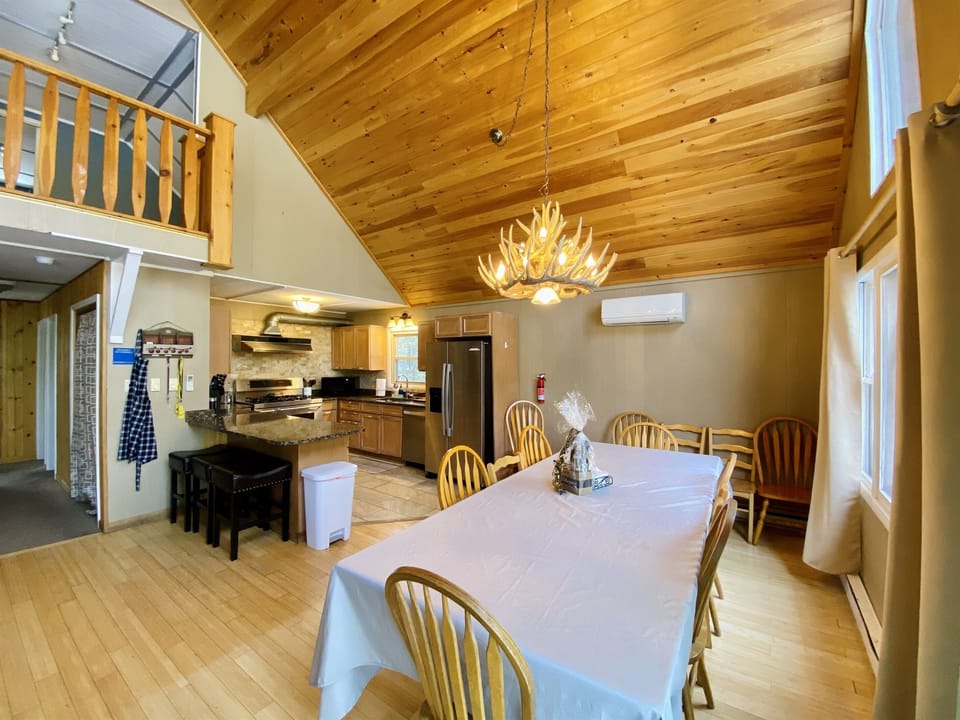View of the dining room and kitchen area. 