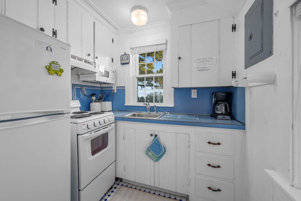 Kitchen with fridge and stove/oven