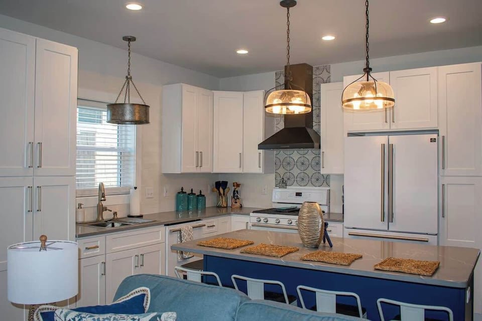 You’ll find plenty of prep space on the countertops and kitchen island, along with all the cookware, bakeware, dishware, flatware, glassware, serving-ware, and utensils you need to prepare and serve your favorite meals. 
