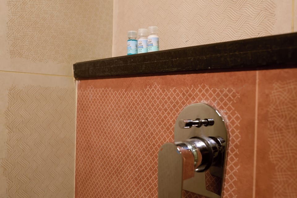 Shower, slippers, towels, soap
