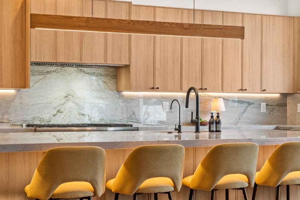 Cooking is a communal affair with the 8-person quartzite island.