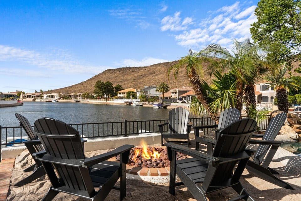 Gather with friends around the lakeside fire pit for an evening of relaxation and stunning waterfront sunset views.
