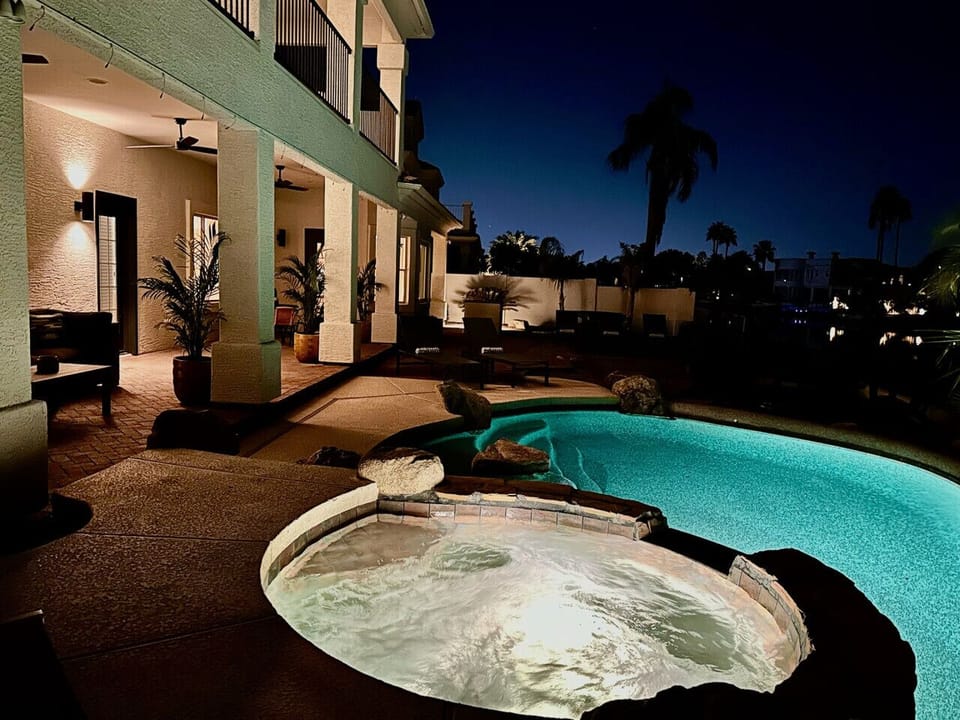 Experience ultimate luxury under the stars in your private heated pool and bubbling hot tub with ambient outdoor lighting.