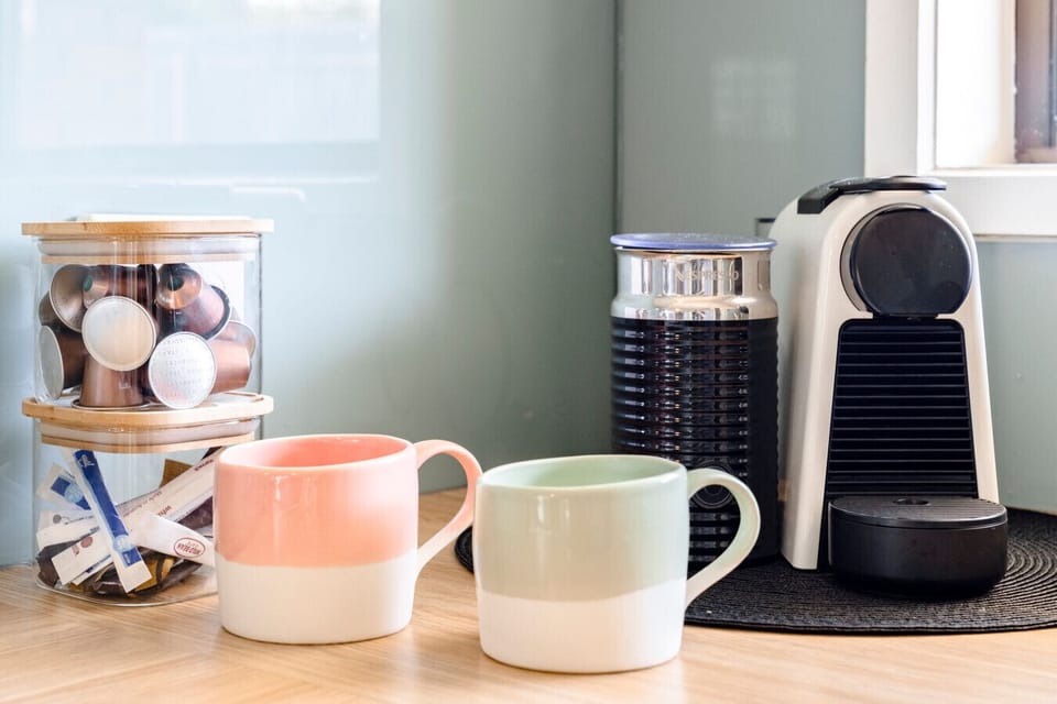 A selection of tea and coffee pods are provided