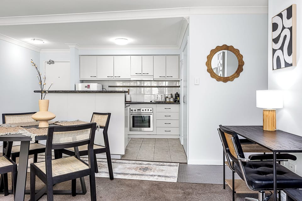 Enjoy a seamless flow between dining and kitchen areas, perfect for modern living and entertaining.