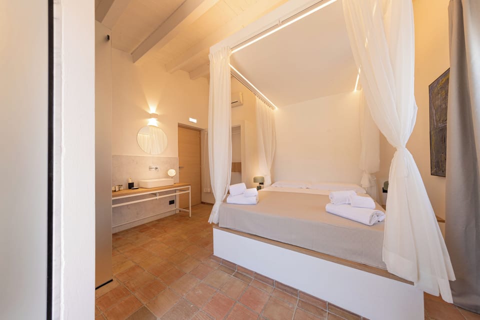 Deluxe Room, Jetted Tub, Sea View | In-room safe, blackout drapes, free WiFi, bed sheets