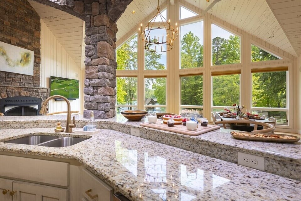 Expansive kitchen bar and food prep area with gorgeous views