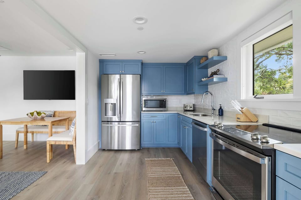 Fully equipped kitchen with everything you need to cook a meal and dining seating for four!