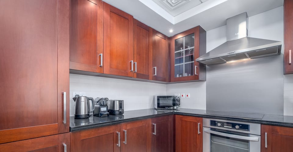 Apartment, City View | Private kitchen | Highchair