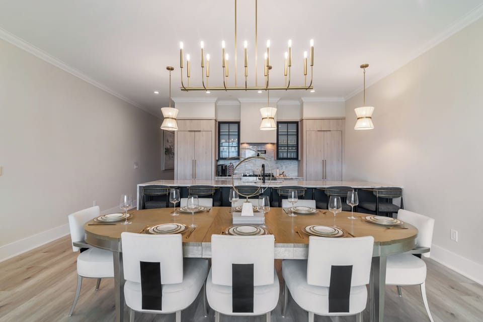 Coastal modern dining table with seating for the whole group
