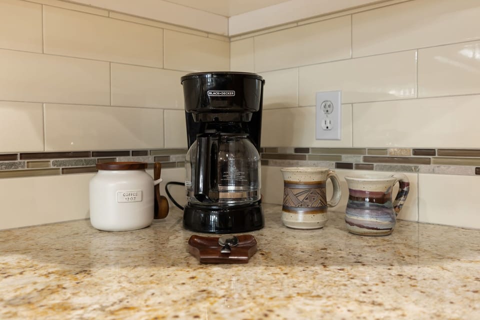 Of course there is coffee! A drip machine to save K Cups. 