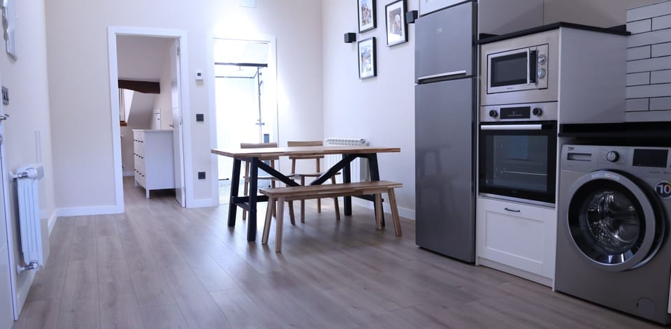 Luxury Apartment, City View | Living area | 50-inch Smart TV with cable channels