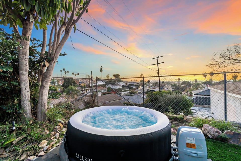 Relax in the hot tub with a stunning skyline view.